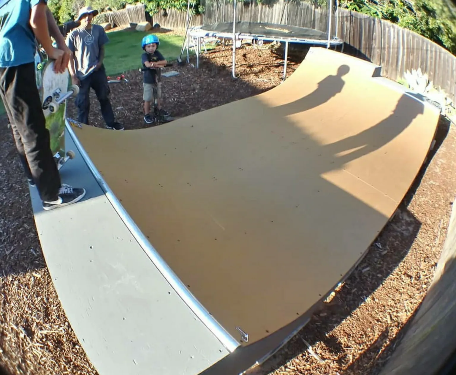 Two foot high miniramp with six inch extension with kids skating