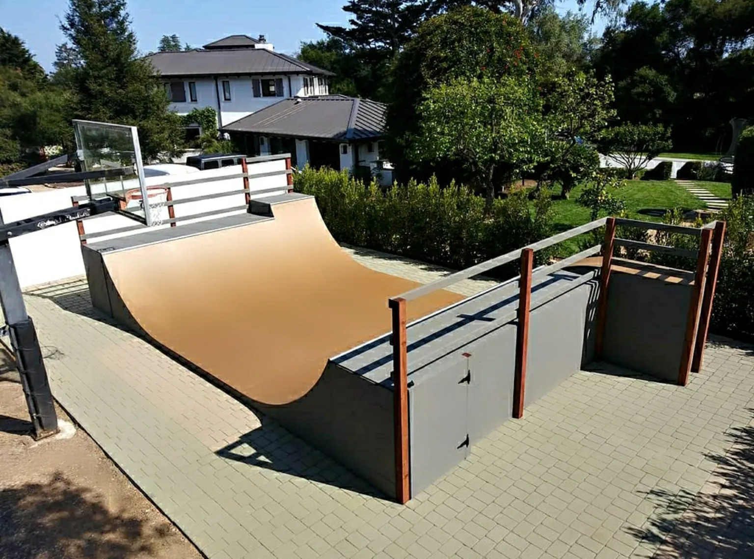 Side view of custom miniramp with extension and roll-in