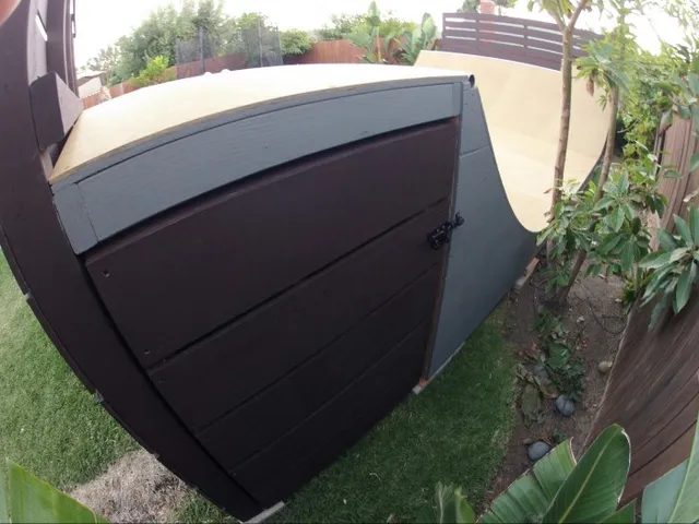 Right side view of paneled storage access, door closed