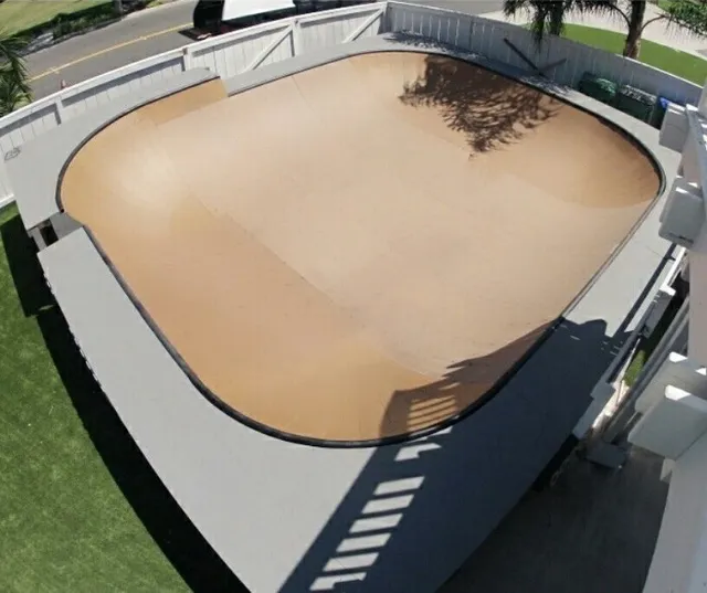 Aerial view of backyard bowl with extension corner